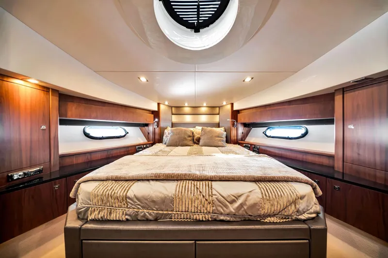 Slide: The Image of Luxurious bedroom interior of 2012 Sunseeker 74 Sport Yacht with elegant wood finishes. - 36