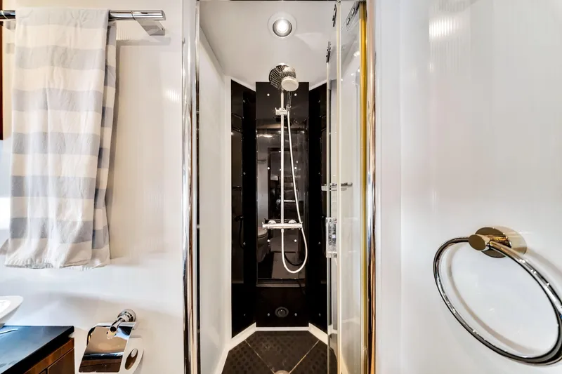 Slide: The Image of Luxurious shower in 2012 Sunseeker 74 Sport Yacht bathroom, featuring modern fixtures and elegant design. - 45