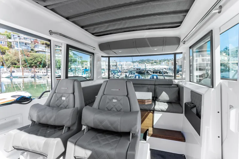 Slide: The Image of Interior of 2021 Axopar 37 XC BRABUS Trim Wet Bar, featuring luxurious seating and modern design. - 20