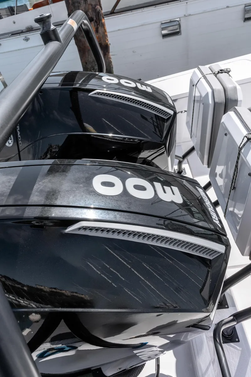 Slide: The Image of Twin outboard engines on 2021 Axopar 37 XC BRABUS Trim Wet Bar boat. - 29