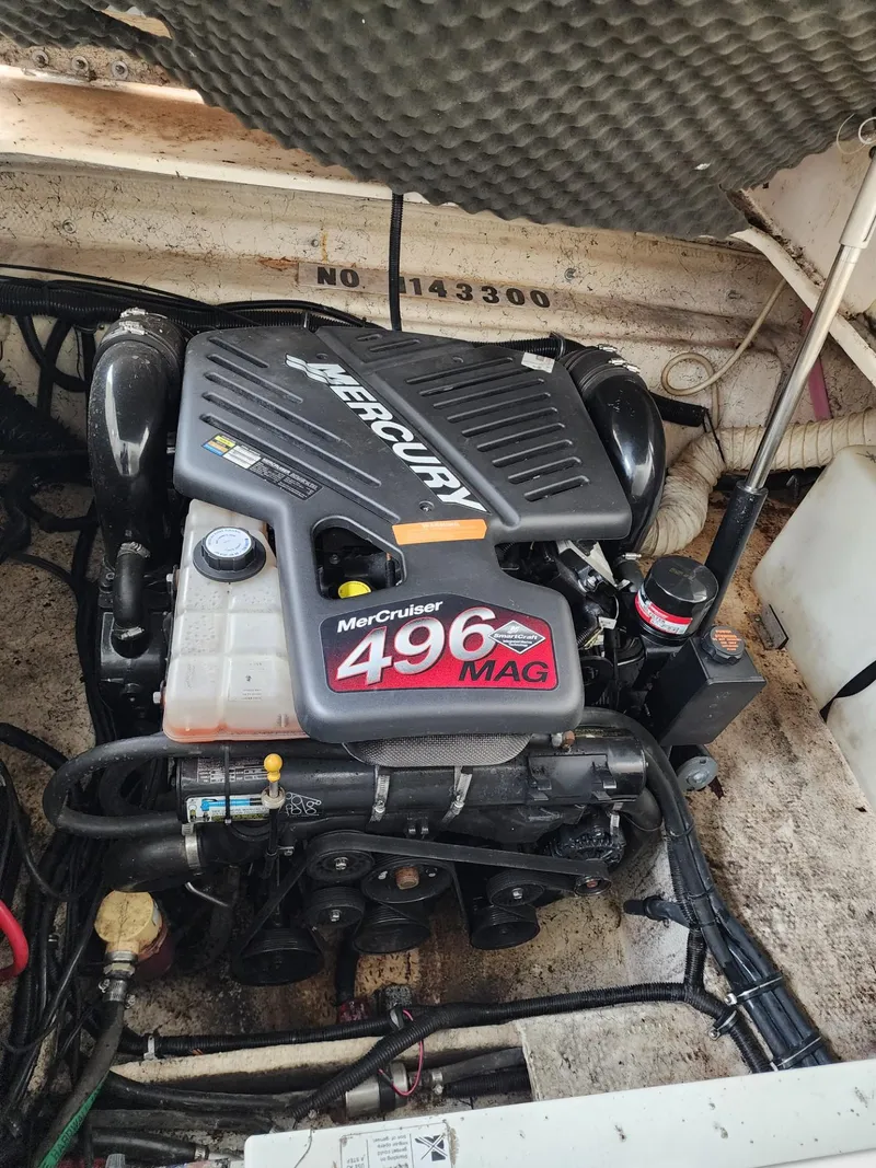 Slide: The Image of MerCruiser 496 MAG engine in 2003 Rinker 270 Express Cruiser boat. - 34