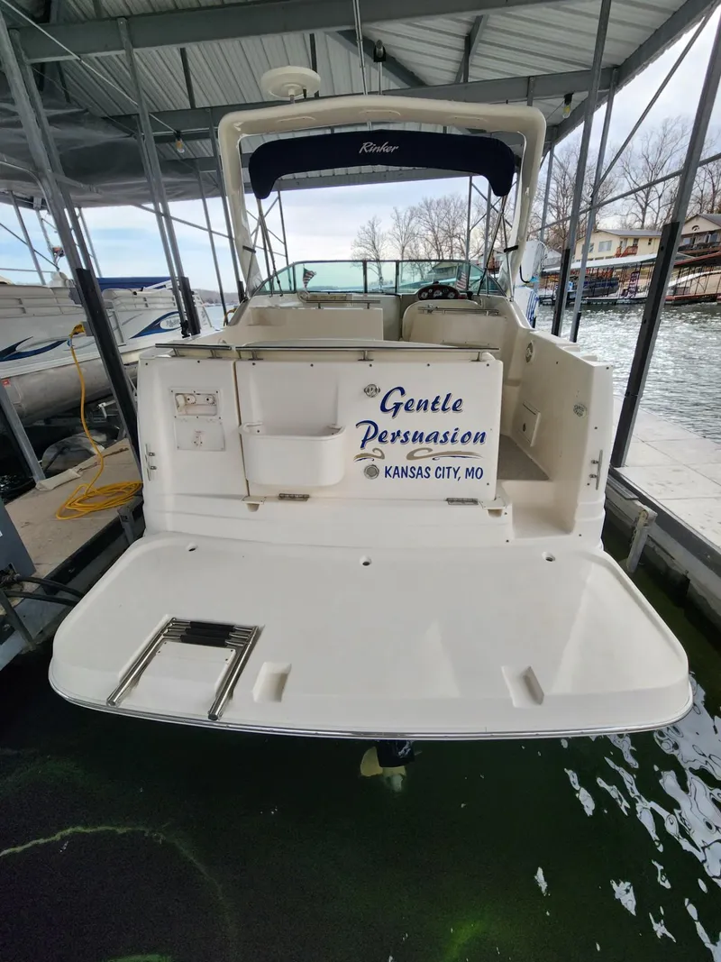 Slide: The Image of 2003 Rinker 270 Express Cruiser docked, named "Gentle Persuasion," Kansas City, MO. - 5