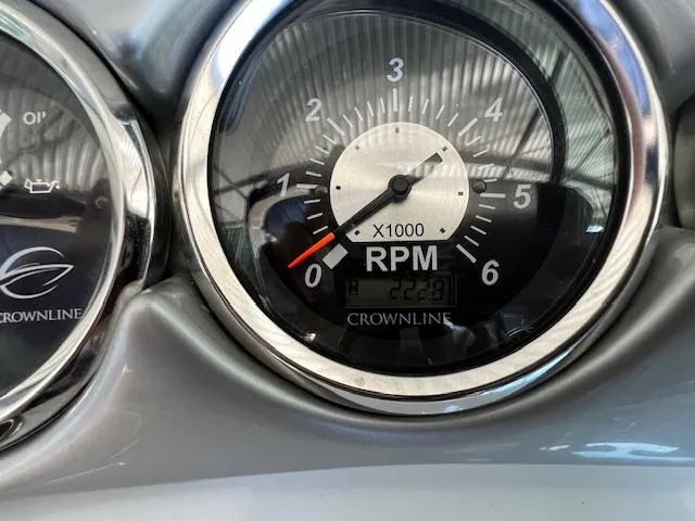 Slide: The Image of Tachometer of 2012 Crownline 325 SS boat showing RPM and engine hours. - 17