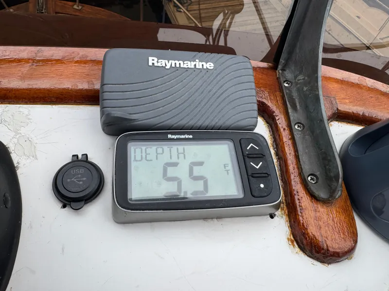 Slide: The Image of Depth gauge on 1981 Marine Trader 34 Double Cabin showing 5.5 feet. - 25
