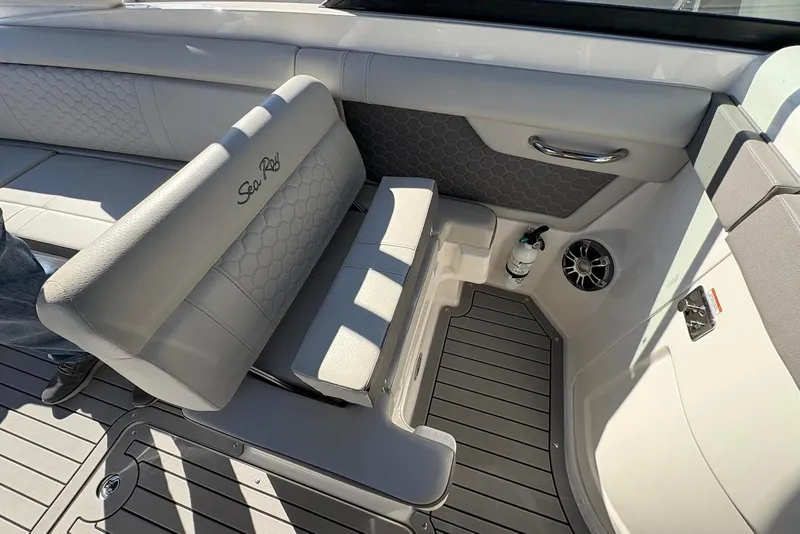 Slide: The Image of 2021 Sea Ray SDX 270 Outboard interior with gray seating and modern design. - 19