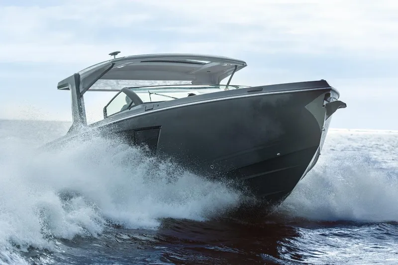 Slide: The Image of Manufacturer Provided Image: 2023 Aviara AV40 OB boat cruising through waves. - 2