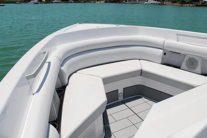 Slide: The Image of Luxurious seating area on 2023 Aviara AV40 OB boat, with sleek white upholstery. - 9