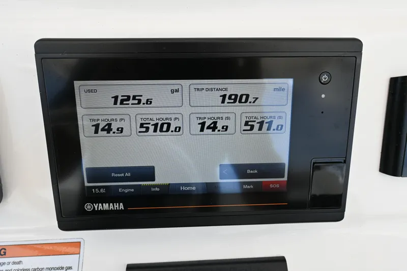 Slide: The Image of Yamaha display showing fuel usage and trip data on a 2022 Contender 30 ST boat. - 15
