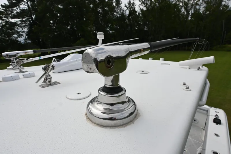 Slide: The Image of Close-up of a 2017 Yellowfin 36 boat's chrome antenna mount on deck. - 11