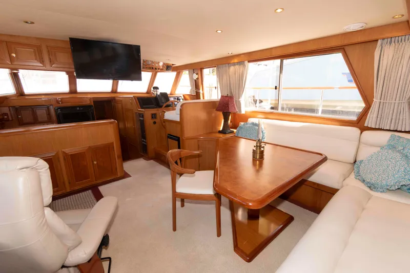 Slide: The Image of Luxurious interior of 1999 Ocean Alexander 486/510 Classico yacht with elegant wood finishes. - 27