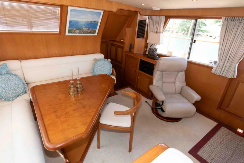 Slide: The Image of Luxurious interior of 1999 Ocean Alexander 486/510 Classico yacht with elegant seating and decor. - 30