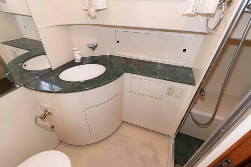 Slide: The Image of Luxurious bathroom in 1999 Ocean Alexander 486/510 Classico yacht with elegant fixtures. - 41