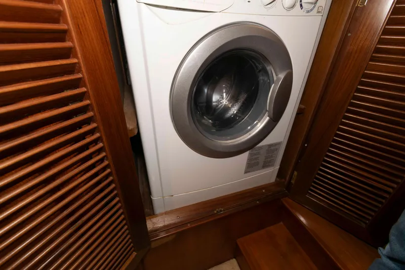 Slide: The Image of Washing machine in 1999 Ocean Alexander 486/510 Classico yacht's wooden interior. - 45