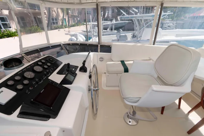 Slide: The Image of 1999 Ocean Alexander 486/510 Classico helm with steering wheel and control panel. - 6