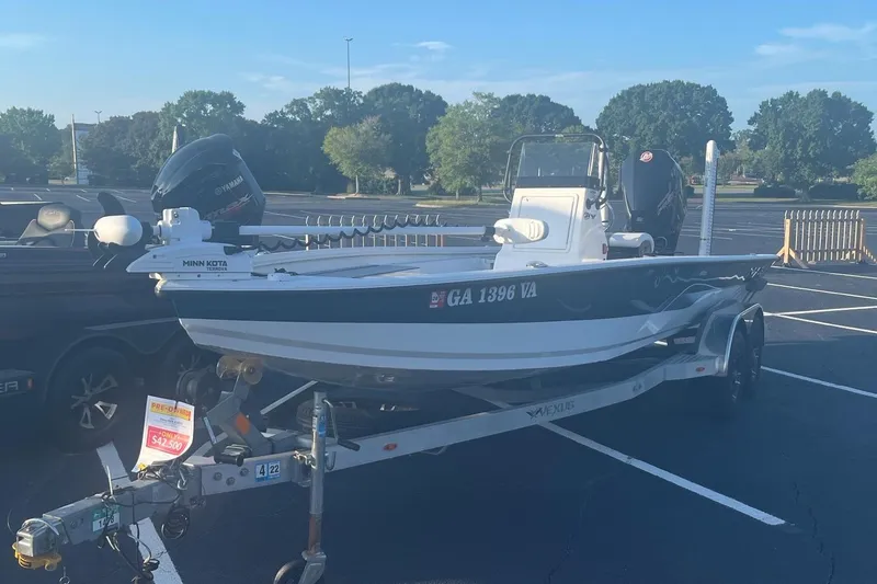 The Image of 2020 Vexus AVX2180CC boat on trailer, featuring Yamaha motor and Minn Kota trolling motor. - 1