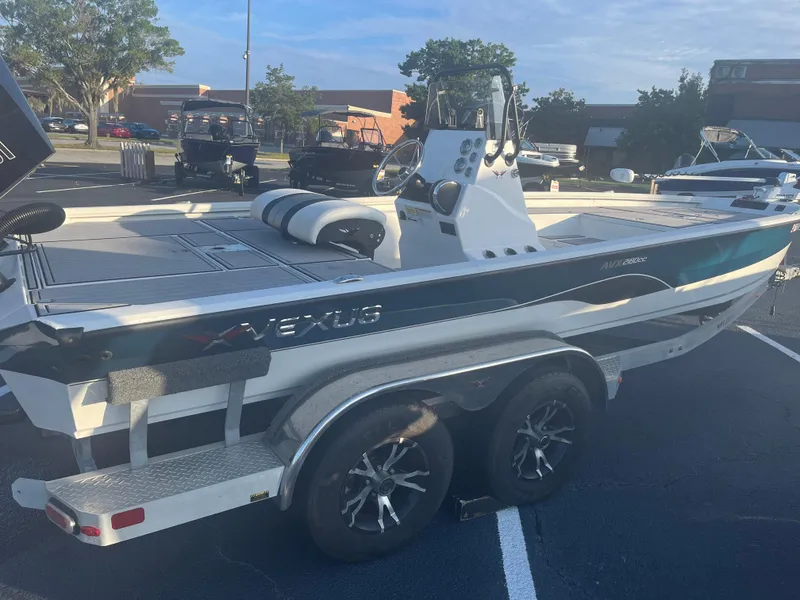 Slide: The Image of 2020 Vexus AVX2180CC boat on trailer in parking lot, side view. - 3