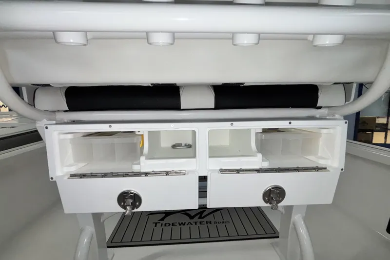 Slide: The Image of Interior view of 2026 Tidewater 2110 Bay Max boat storage compartments. - 13