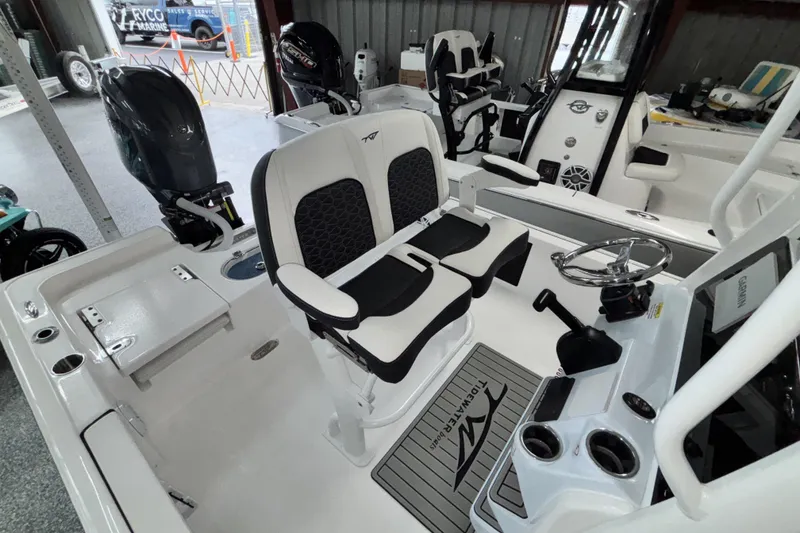 Slide: The Image of 2026 Tidewater 2110 Bay Max boat interior with dual seats and steering console. - 16