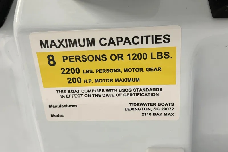 Slide: The Image of 2026 Tidewater 2110 Bay Max capacity label: 8 persons, 1200 lbs, 200 HP motor. - 33