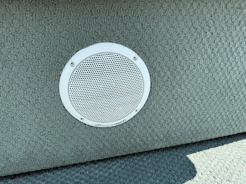 Slide: The Image of Speaker on Playbuoy Yachtsman 21 boat, 2000 model, with textured gray upholstery. - 18