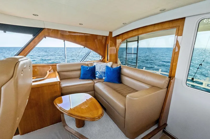 Slide: The Image of Luxurious interior of 2017 Viking 62 Enclosed Bridge yacht with ocean view. - 59