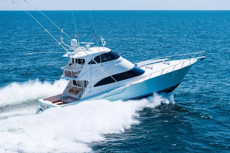 Slide: The Image of 2017 Viking 62 Enclosed Bridge yacht cruising on open sea. - 73