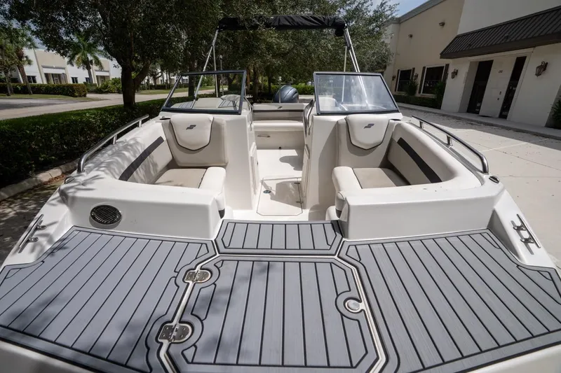 Slide: The Image of 2022 Starcraft SVX 190 DC boat with spacious seating and sleek design. - 14