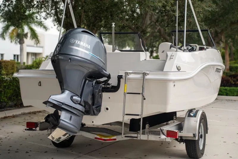 Slide: The Image of 2022 Starcraft SVX 190 DC boat with Yamaha outboard motor on trailer. - 4
