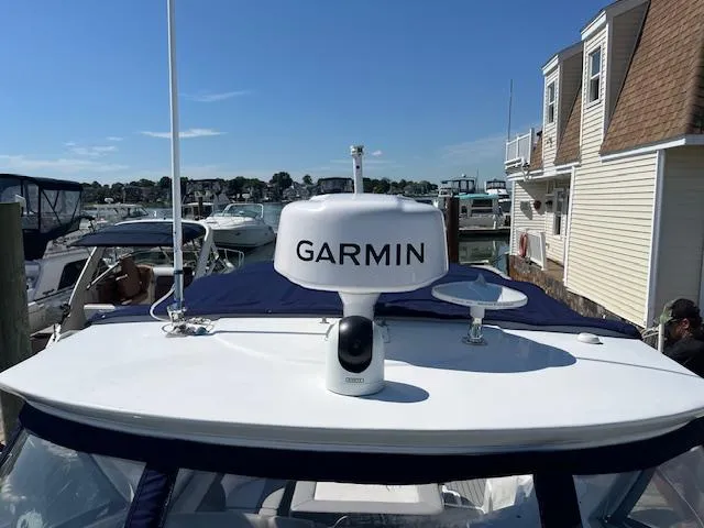 Slide: The Image of 2022 Monterey 295 Sport Yacht with Garmin radar at marina dock. - 10