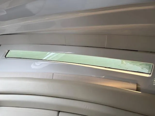 Slide: The Image of Interior view of 2022 Monterey 295 Sport Yacht with sleek window design. - 27