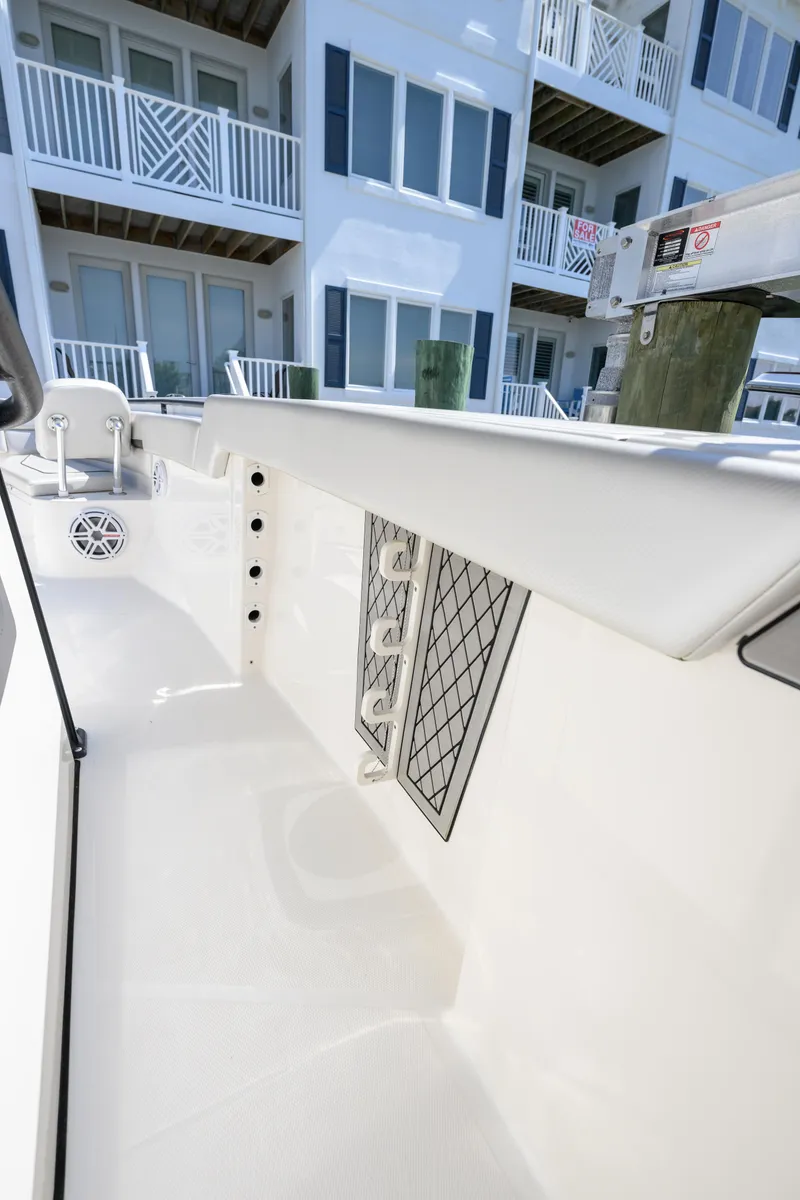 Slide: The Image of 2019 Wellcraft 352 Fisherman boat interior with modern design near waterfront buildings. - 15