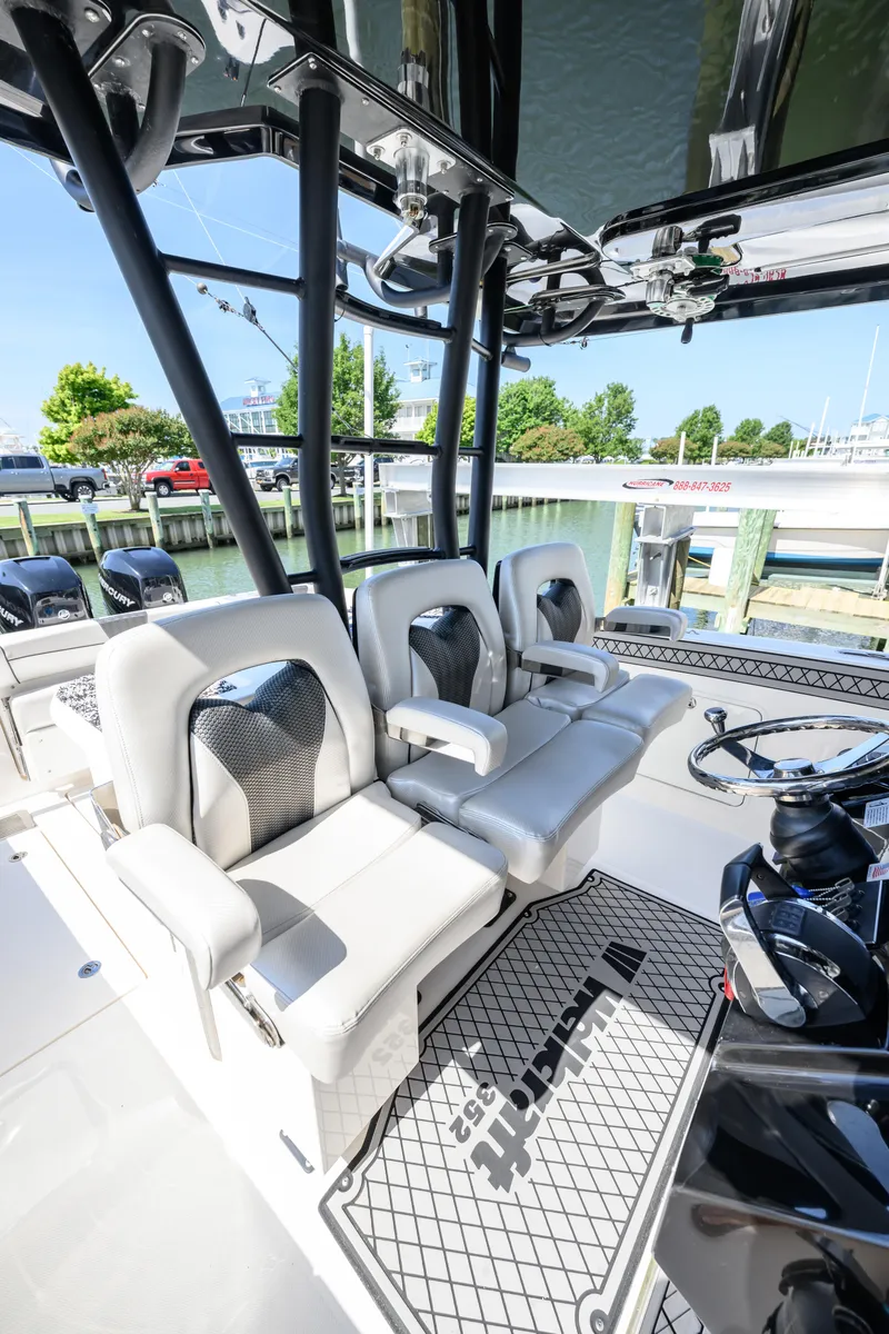 Slide: The Image of 2019 Wellcraft 352 Fisherman boat interior with luxurious seating and modern controls. - 17