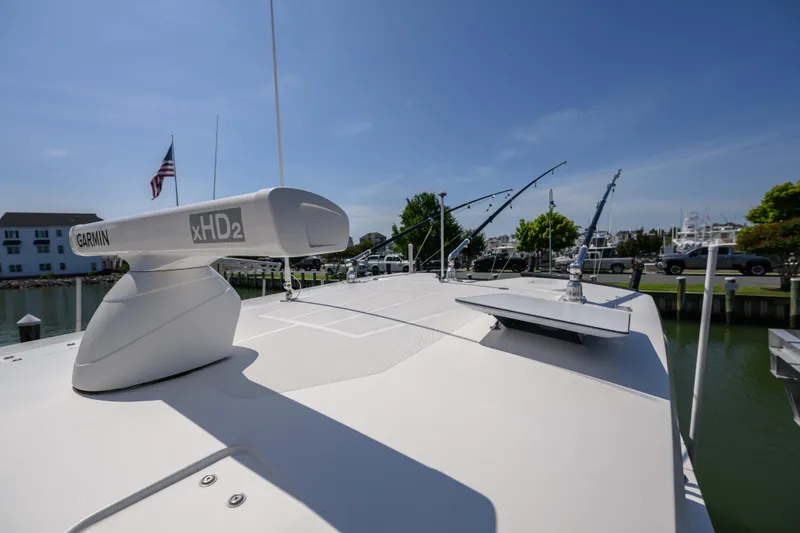 Slide: The Image of 2019 Wellcraft 352 Fisherman boat with Garmin xHD2 radar, docked in a marina. - 9