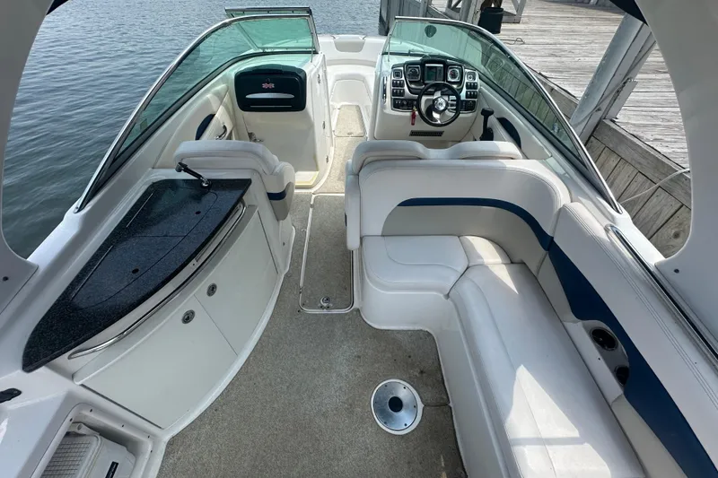 Slide: The Image of Interior of 2011 Chaparral 287 SSX boat with seating and control panel. - 13