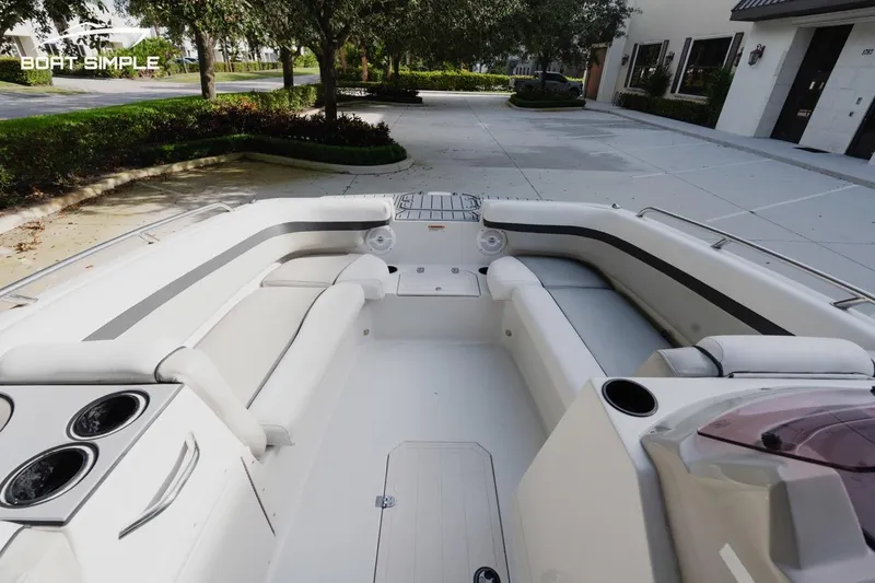 Slide: The Image of 2023 Starcraft SVX 211 OB boat interior with spacious seating and cup holders. - 10
