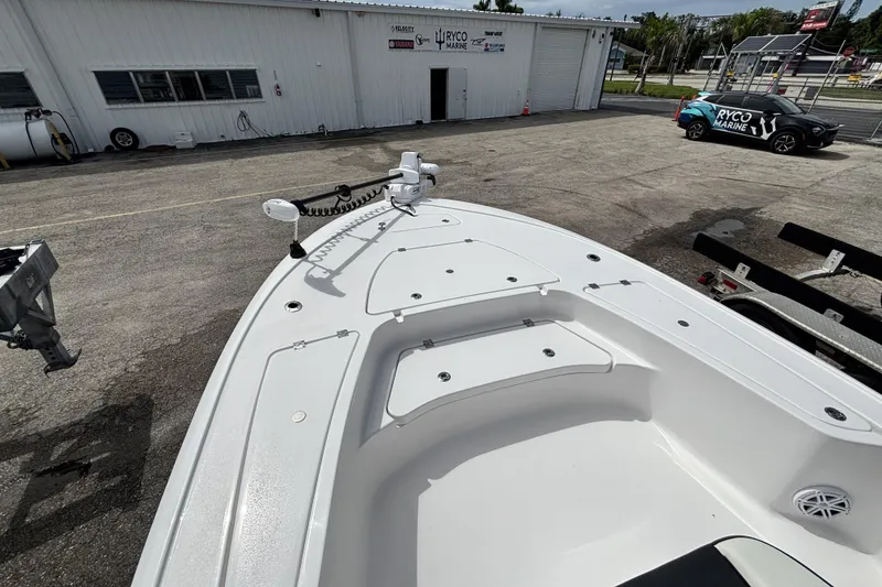 Slide: The Image of 2026 Tidewater 2410 Bay Max boat at Ryco Marine dealership, showcasing bow and storage compartments. - 30