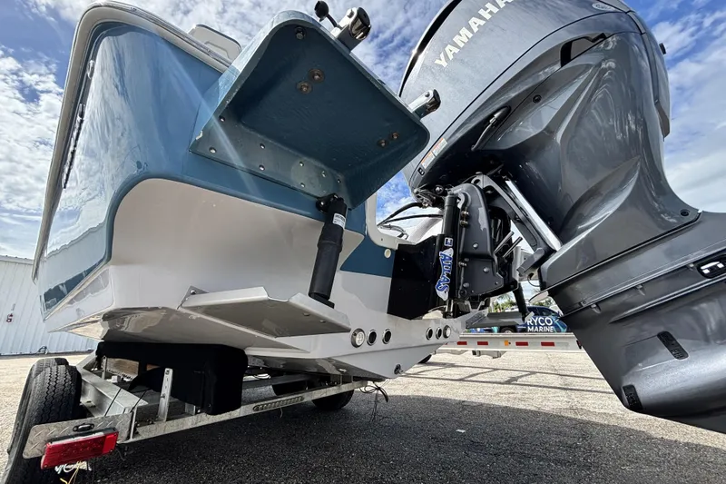 Slide: The Image of 2026 Tidewater 2410 Bay Max boat with Yamaha outboard motor on trailer. - 8