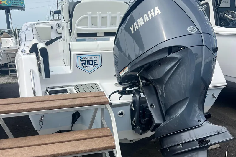 Slide: The Image of 2025 Tidewater 232 LXF boat with Yamaha engine and Seakeeper Ride stabilization. - 10