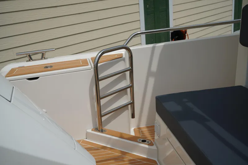 Slide: The Image of 2024 Nimbus Commuter9 C9 boat interior with ladder and seating area. - 10