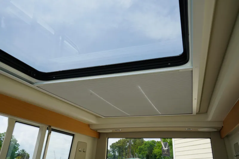 Slide: The Image of 2024 Nimbus Commuter9 C9 interior with large sunroof and modern design. - 26