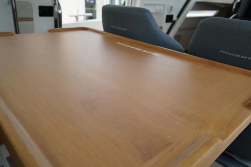 Slide: The Image of Wooden table inside 2024 Nimbus Commuter9 C9, showcasing interior design. - 21