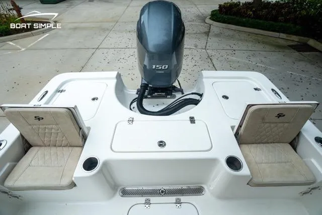 Slide: The Image of 2024 Sea Pro 208 Bay boat with dual seats and 150 HP engine. - 12