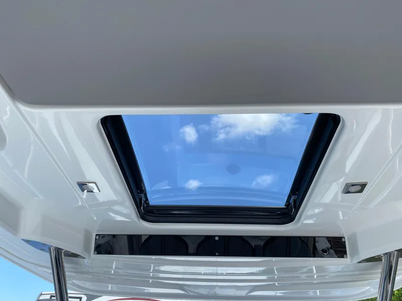 Slide: The Image of Skylight view from Jeanneau Leader 10.5 WA Series 2, 2022 model, showcasing blue sky. - 12