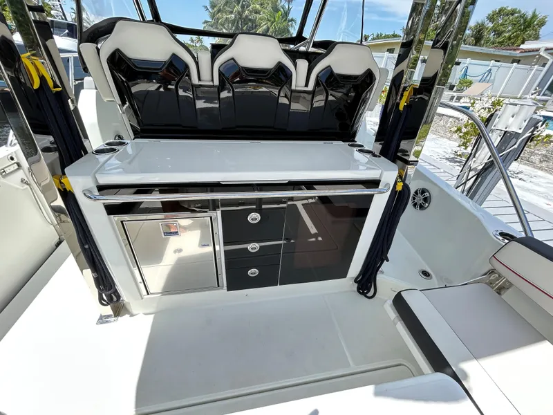 Slide: The Image of 2022 Jeanneau Leader 10.5 WA Series 2 boat interior with seating and storage. - 14