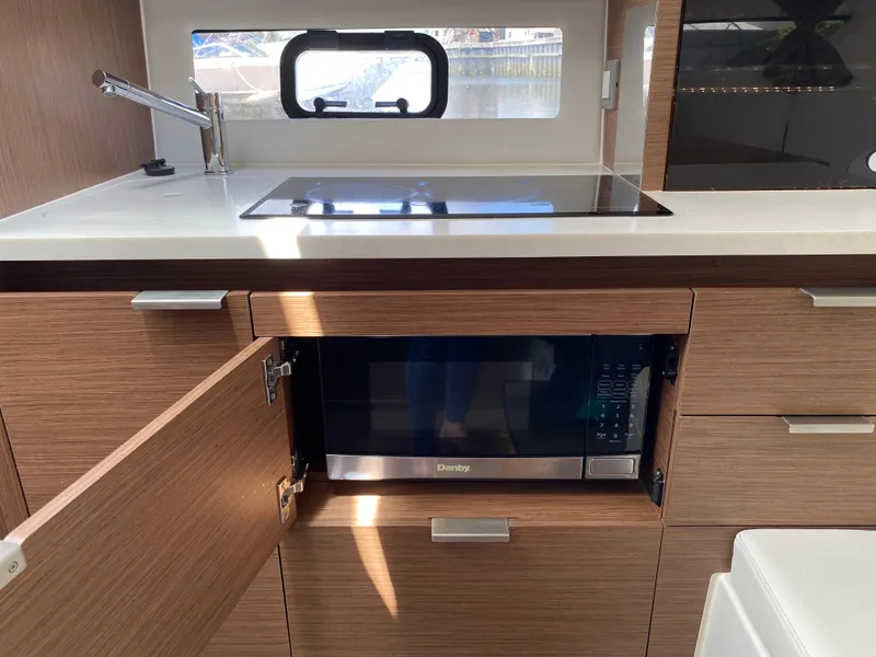 Slide: The Image of Modern kitchen area in 2022 Jeanneau Leader 10.5 WA Series 2 boat. - 20