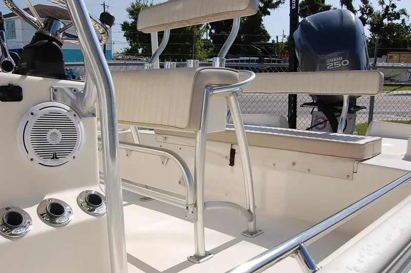 Slide: The Image of Interior of a 2006 Scout 240 boat with seating and Yamaha 250 engine. - 5