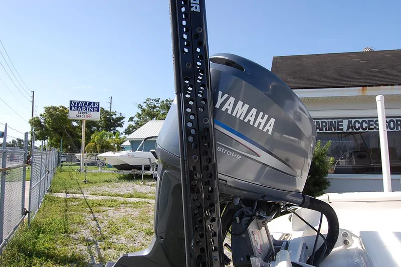 Slide: The Image of Yamaha outboard motor on a 2006 Scout 240 boat at Stellar Marine. - 9