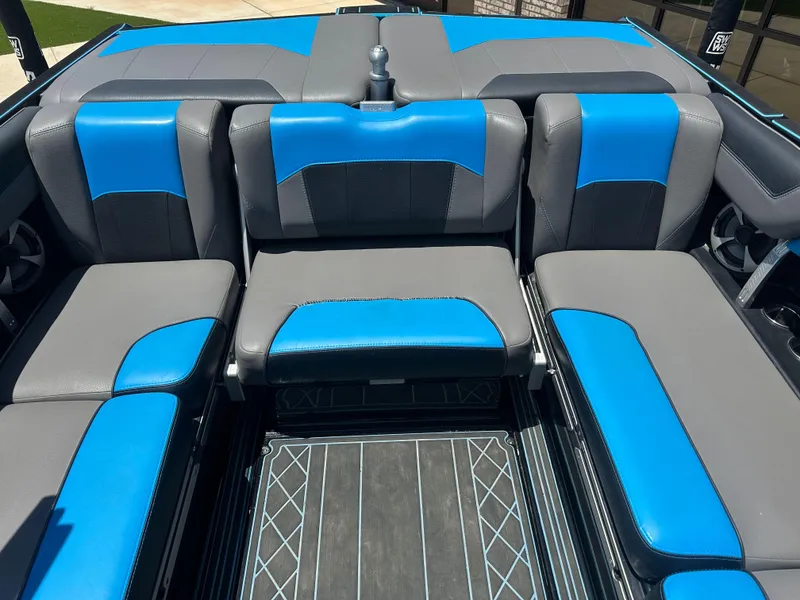 Slide: The Image of 2020 Malibu Wakesetter 25 LSV interior with blue and gray seating. - 14