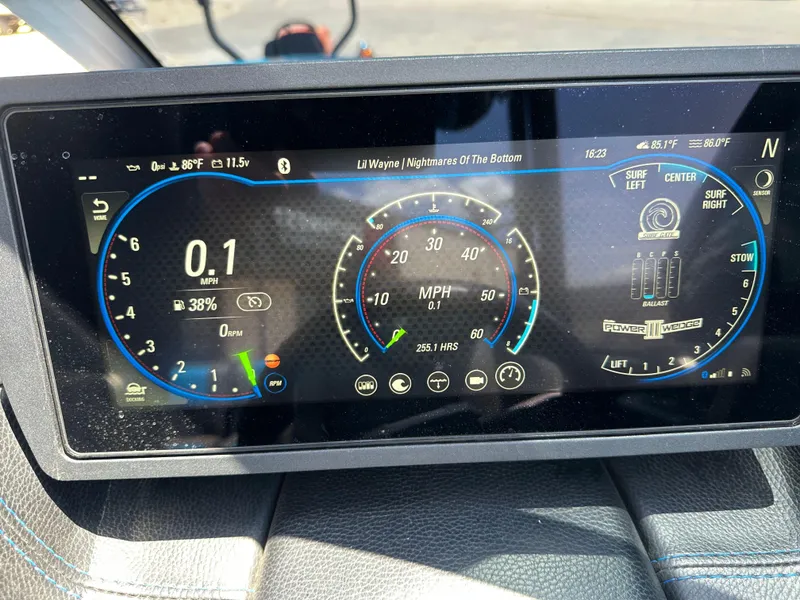 Slide: The Image of Dashboard of a 2020 Malibu Wakesetter 25 LSV boat displaying speed and settings. - 21