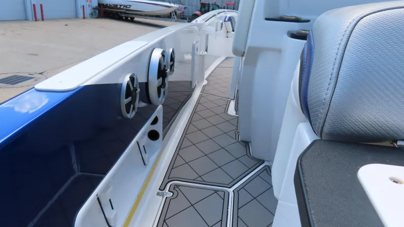 Slide: The Image of 2016 Sunsation 34 CCX boat interior with sleek seating and modern design. - 11